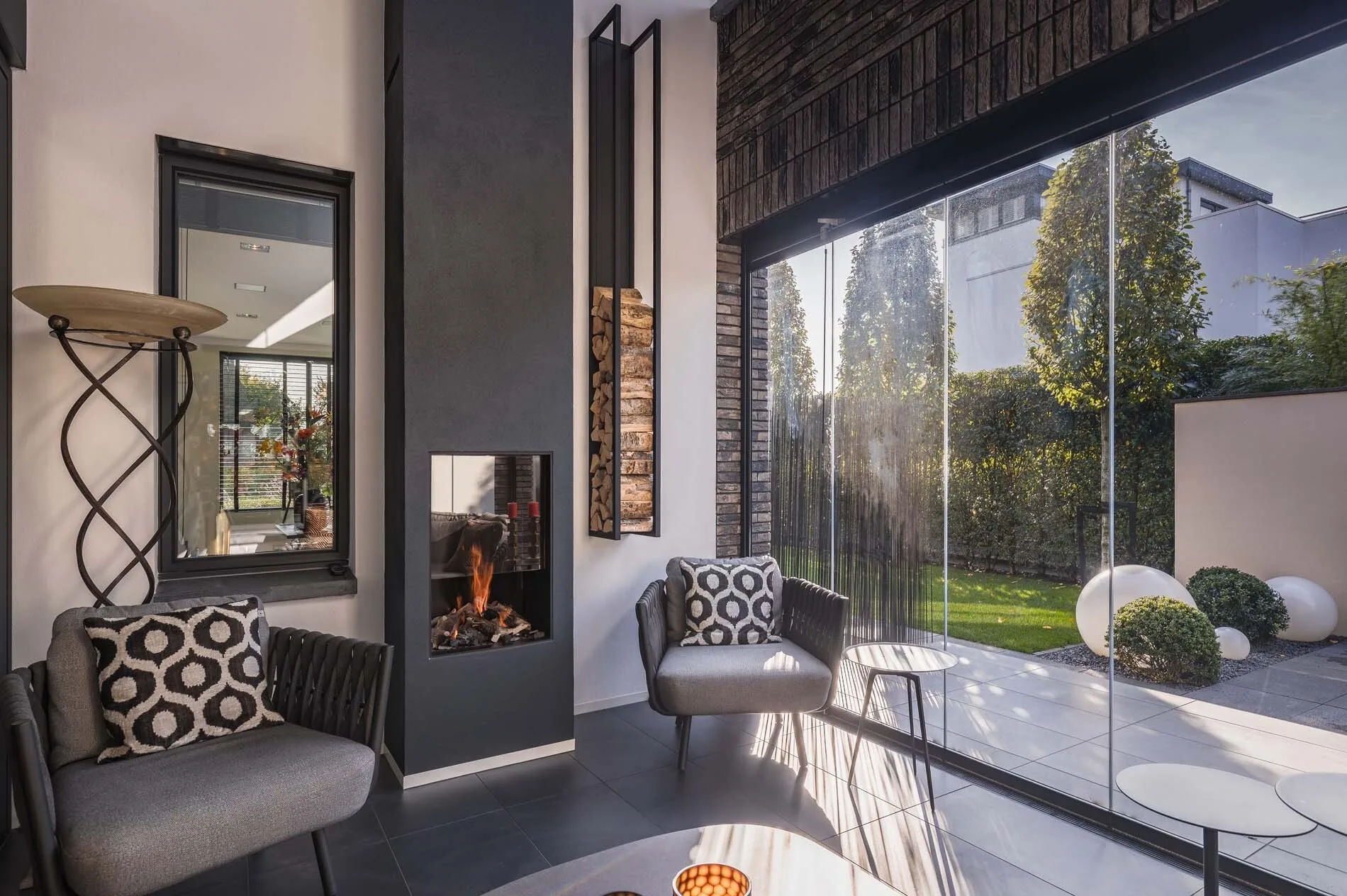 Openhaard met grote glazen pui The Art of Living Klantervaring ASWA Keukens