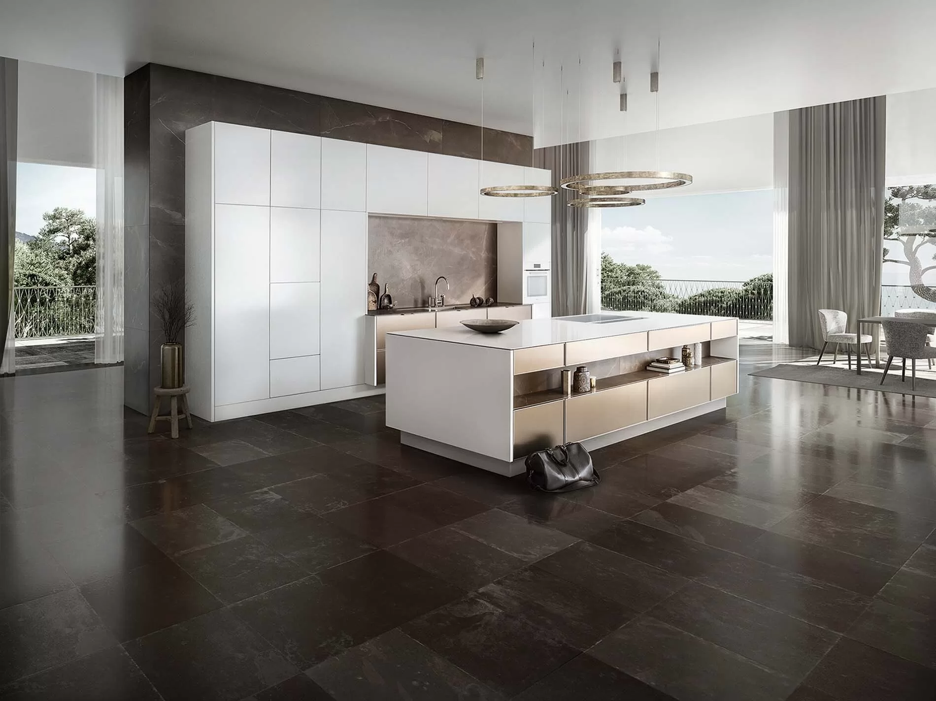 SieMatic kitchen with a metal cooking island and white tall cabinets