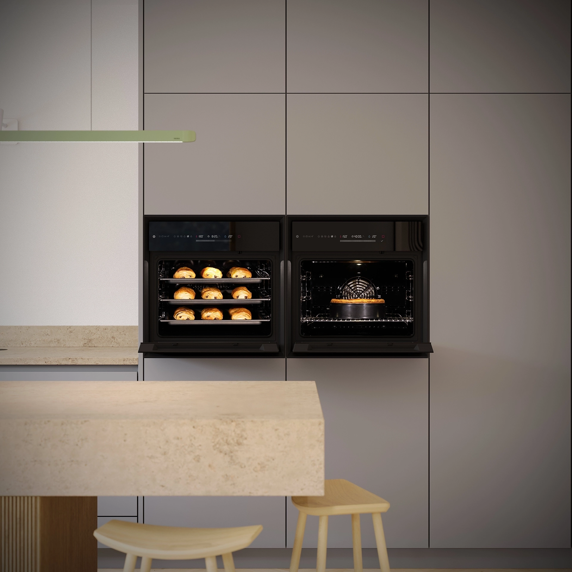 Twee BORA Oven Steam stoomovens naast elkaar ingebouwd in een moderne keuken met lichte keukenkasten
