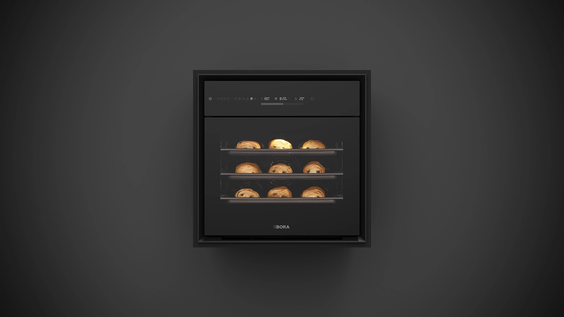 BORA Oven Steam zwarte inbouwstoomoven met versgebakken broodjes op drie niveaus