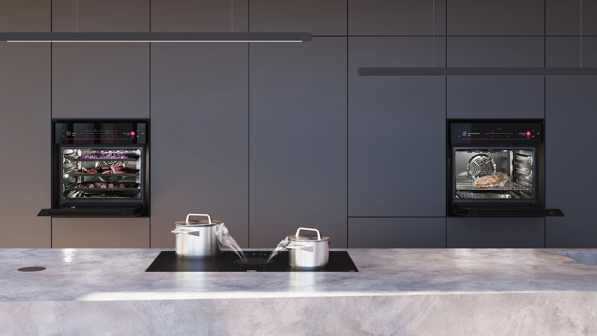 Twee BORA Oven Steam stoomovens ingebouwd in een donkere greeploze keuken met kookeiland