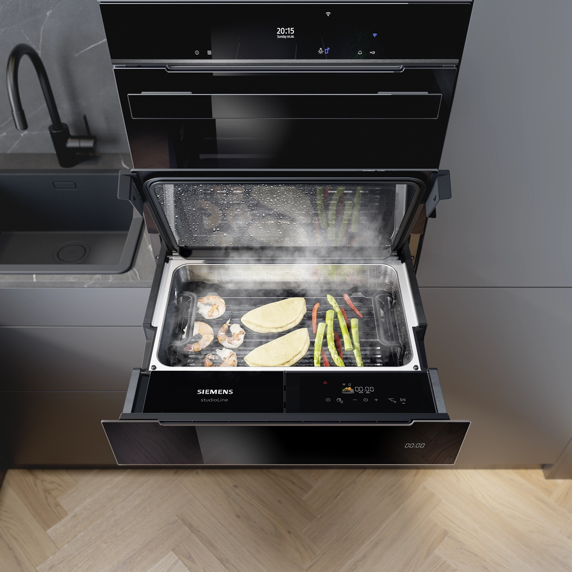 Compacte Siemens stoomlade geopend met verschillende gerechten