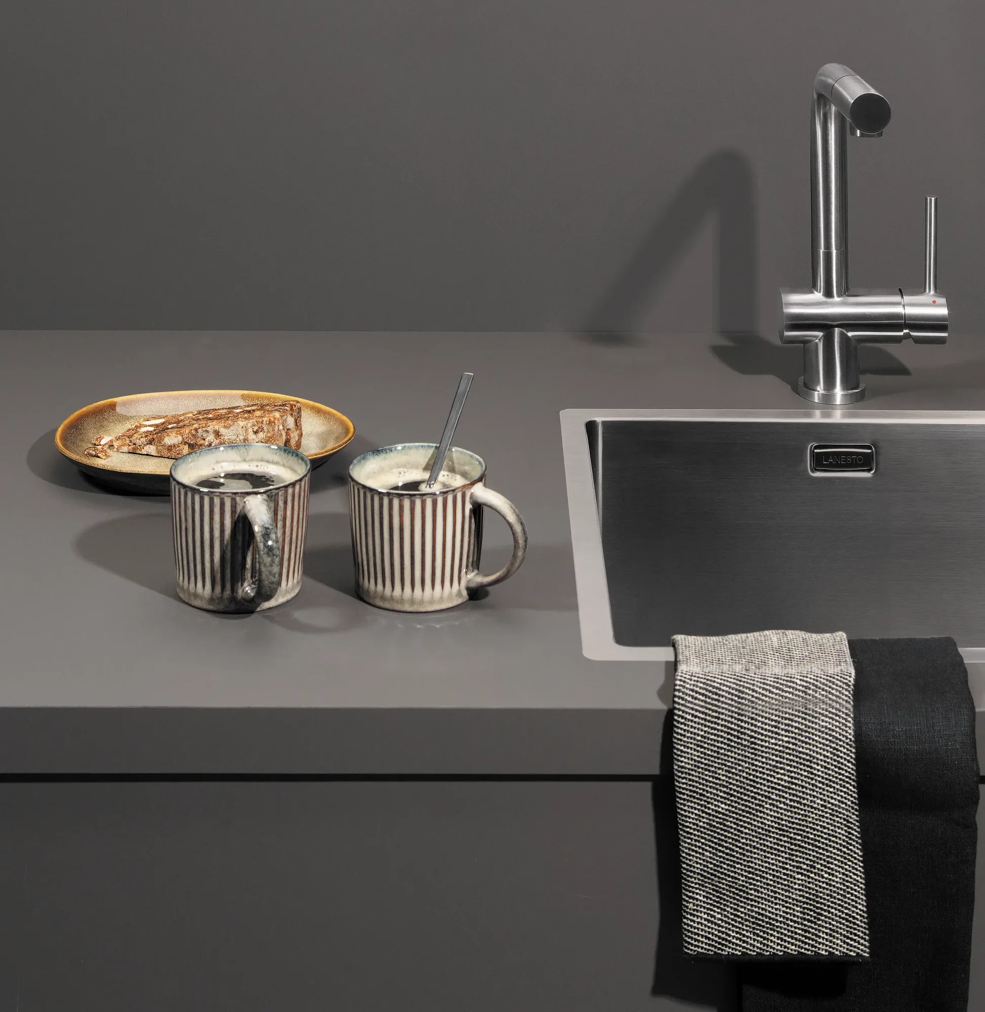 RVS gootsteen schoonmakem Fenix Grigio Aragona keukenblad Dekker ASWA Keukens